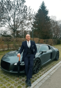 Oliver Martin Biography 17 OLIVER MARTIN Oliver Martin, Swiss entrepreneur lifestyle with luxury car, business success imagery